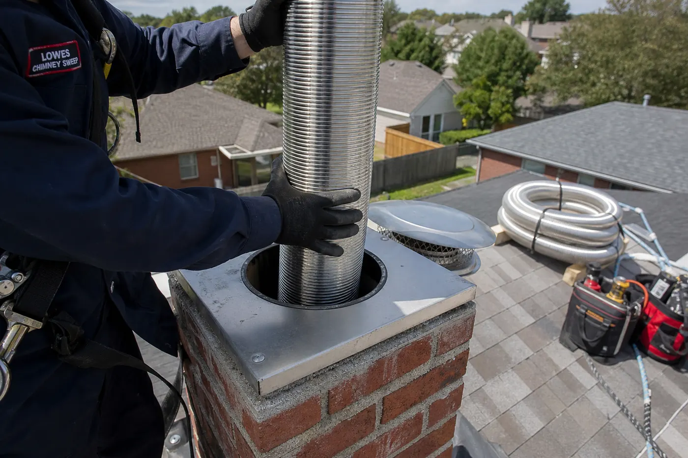 Lowes Chimney Sweep service illustration for Chimney Relining Cost in Dallas: Clay, Stainless & Other Liner Types in a Dallas Fort Worth home