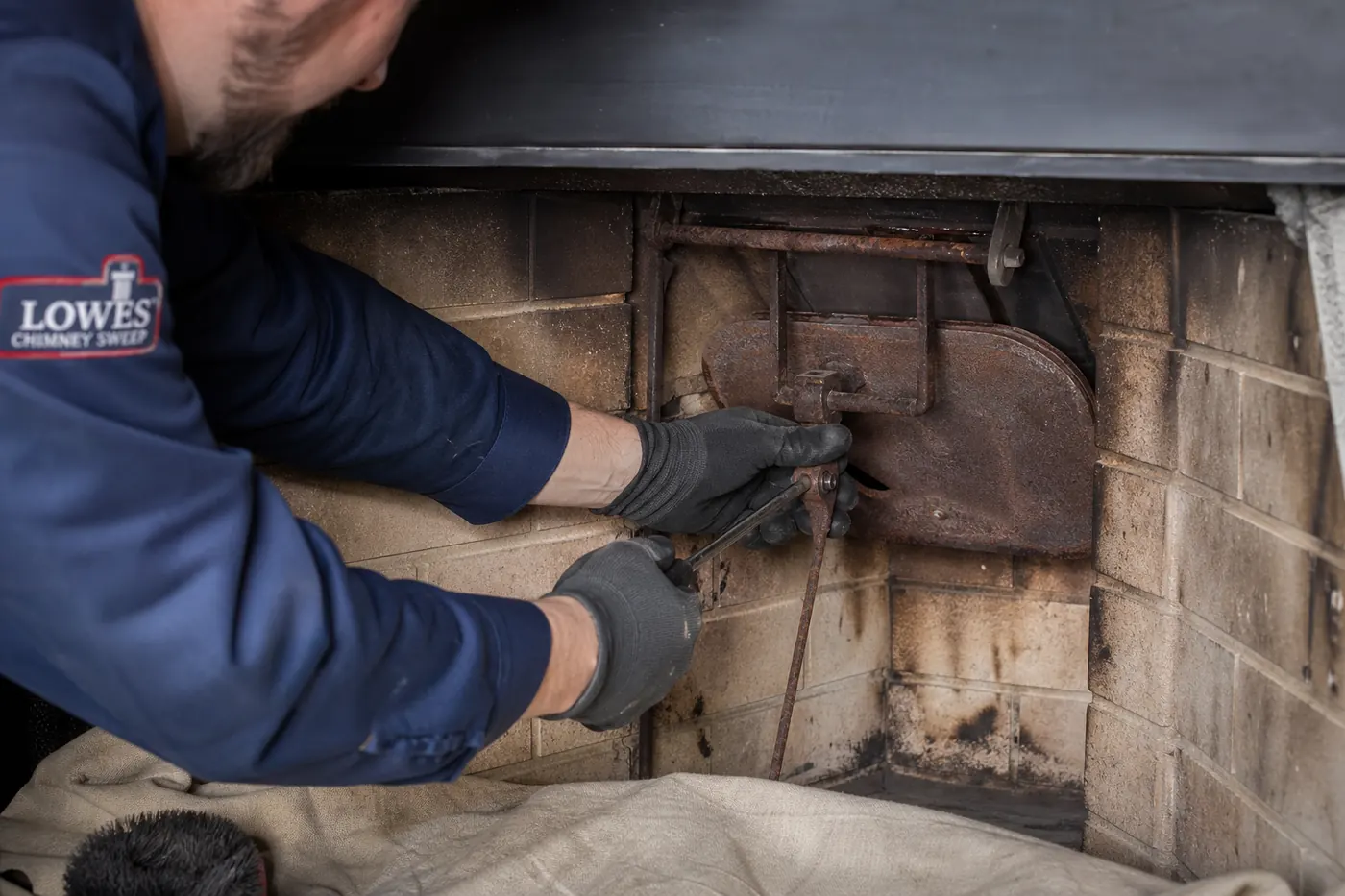 Lowes Chimney Sweep service illustration for Chimney Damper Repair & Replacement Cost in Dallas in a Dallas Fort Worth home