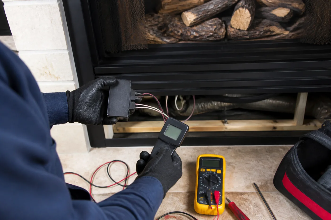 Gas fireplace remote control repair in Dallas-Fort Worth, TX by the Lowes Chimney Sweep crew