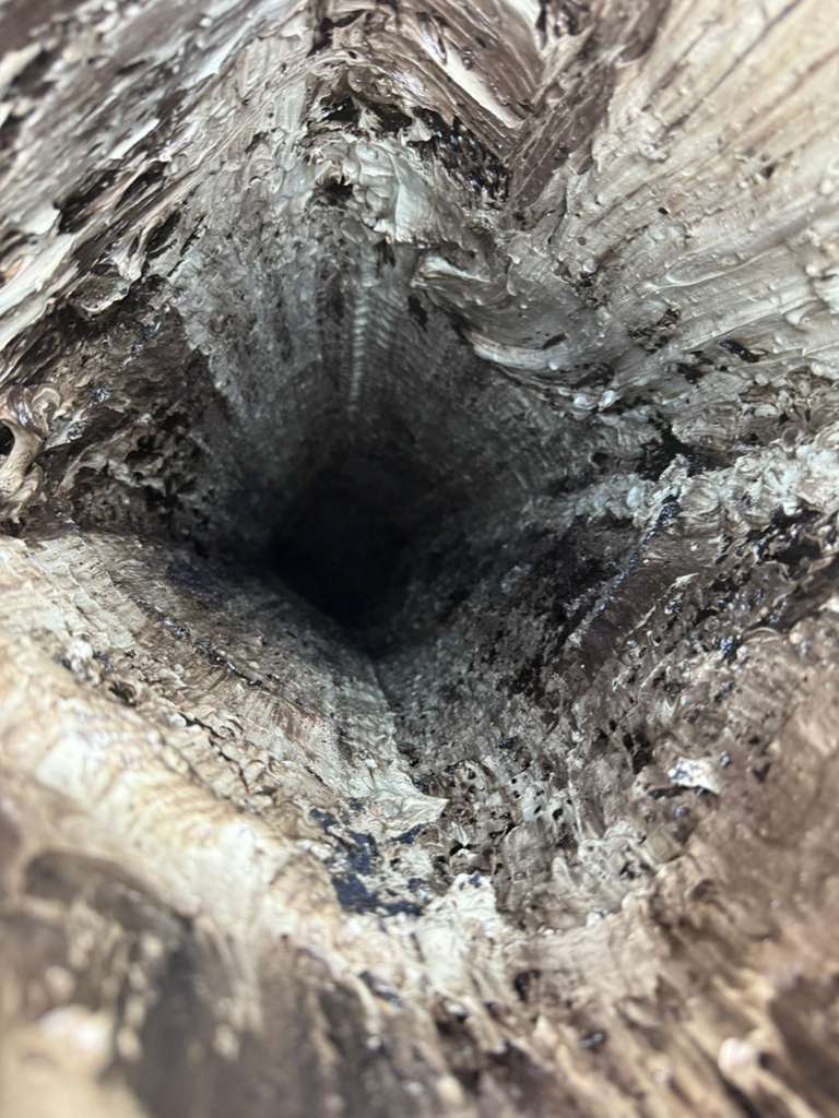 Stage 3 glazed creosote hardened onto the flue walls