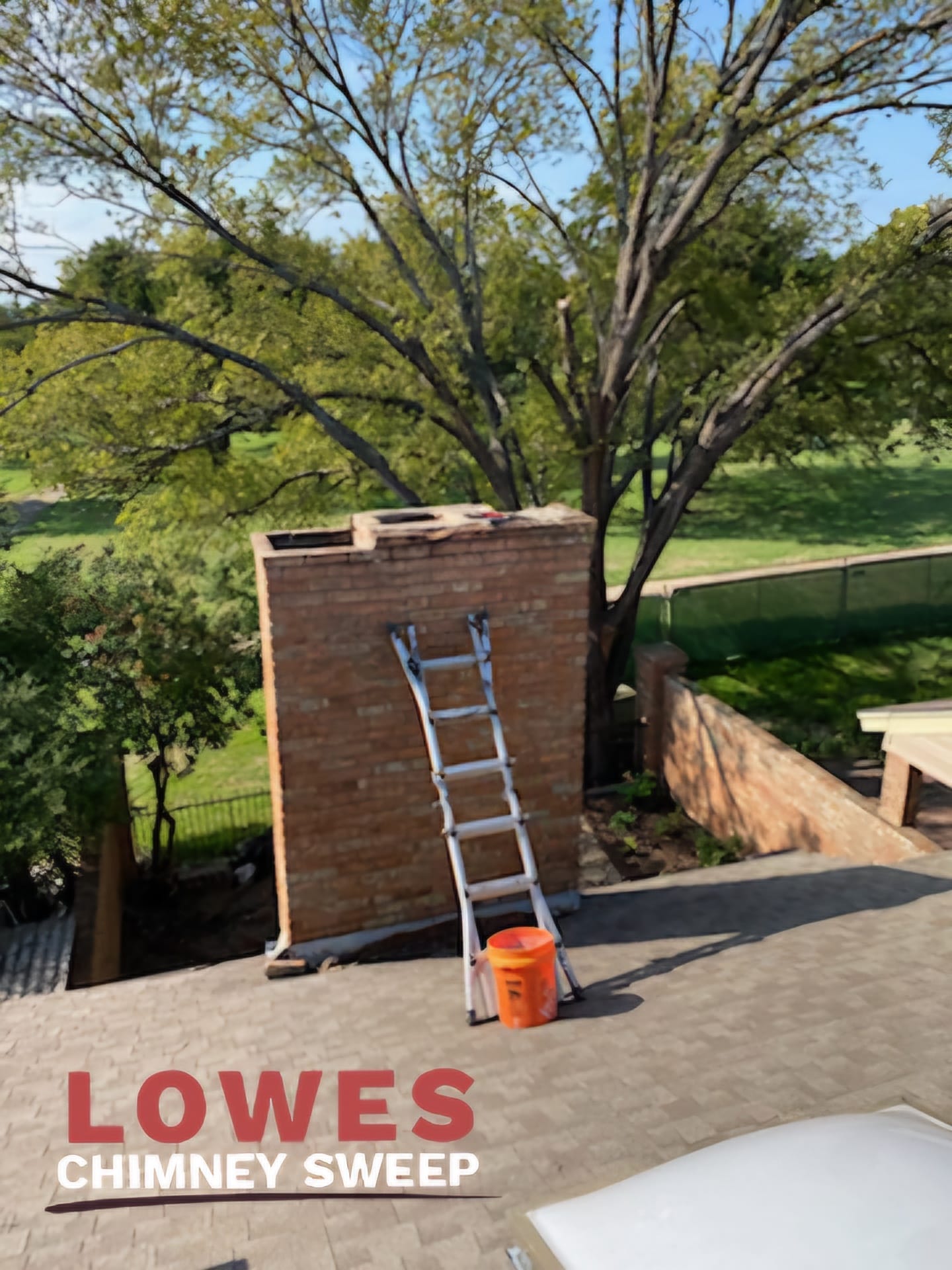 Chimney with failed concrete crown removed, masonry top exposed, Dallas Fort Worth