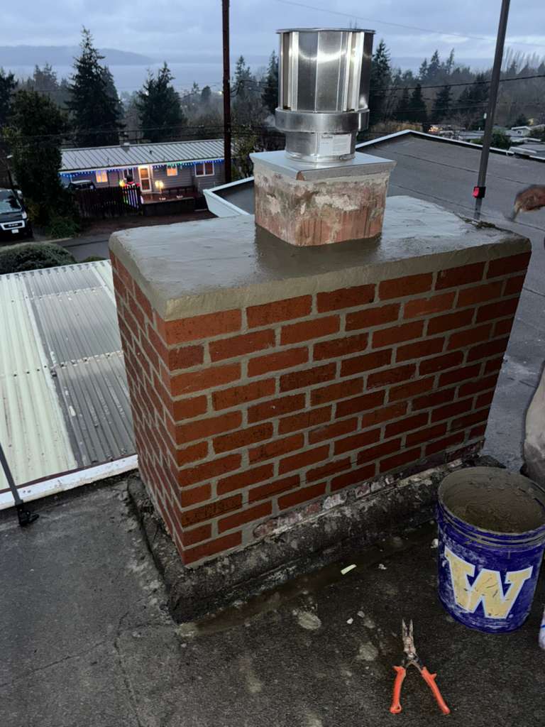 Rebuilt chimney, structurally sound and weather-tight