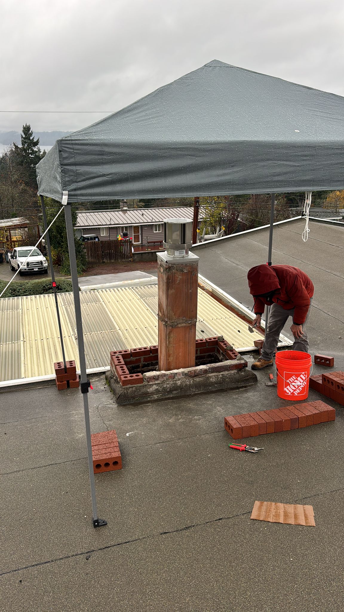 Deteriorated chimney masonry before rebuild