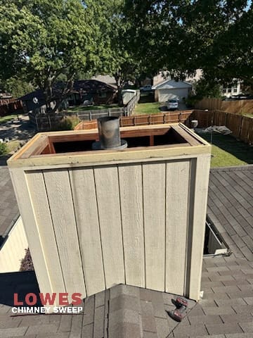 Old chimney cap on a chase chimney before replacement in Dallas Fort Worth