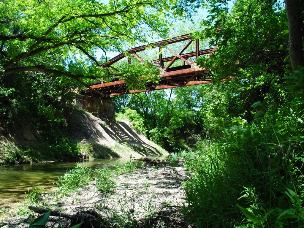 The historic pony truss railroad bridge over Red Oak Creek in Red Oak, Texas