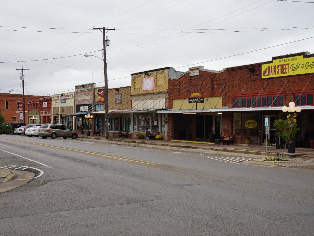Historic brick storefronts along Main Street in Royse City, Texas